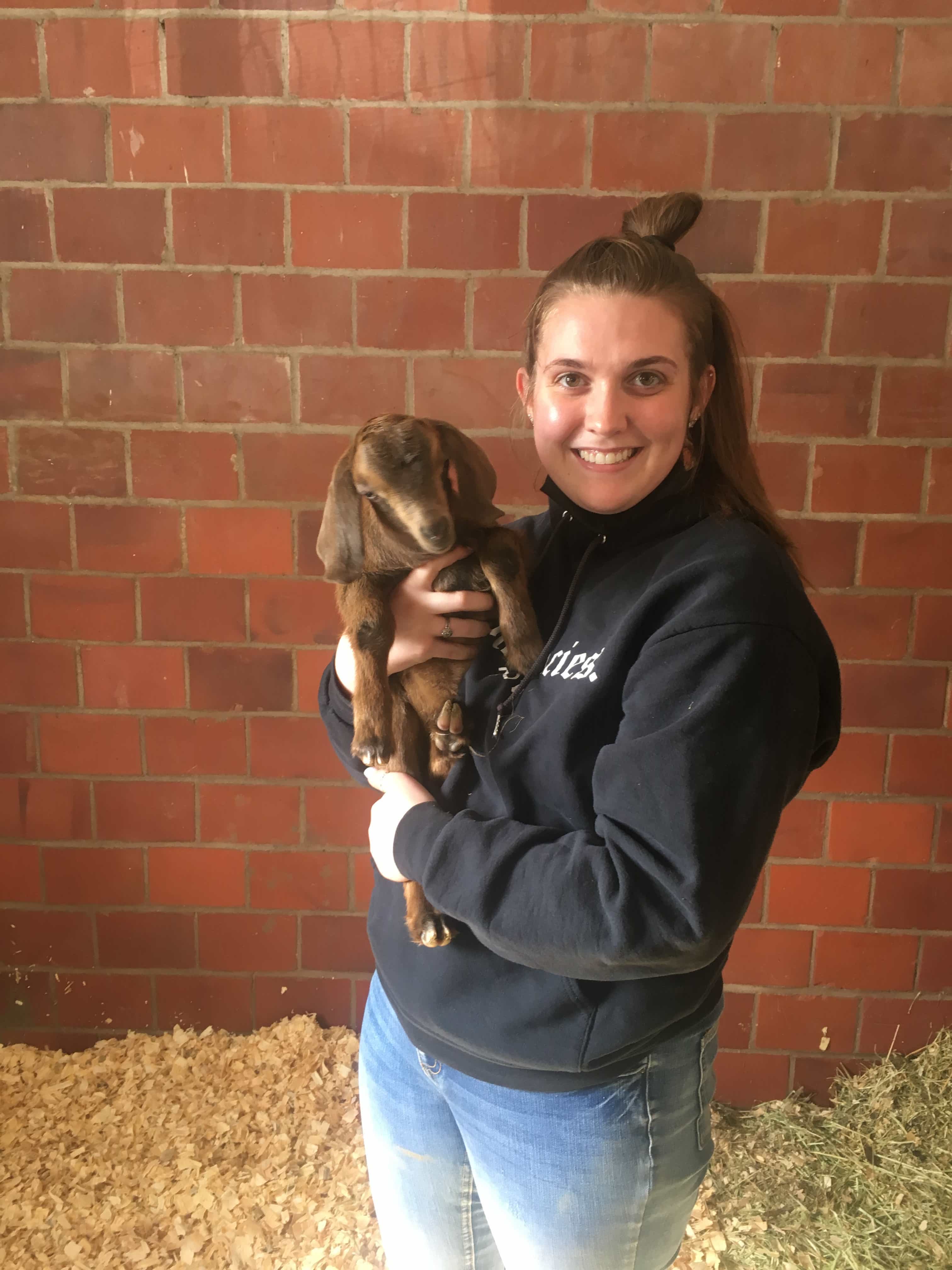 Maddie with baby goat